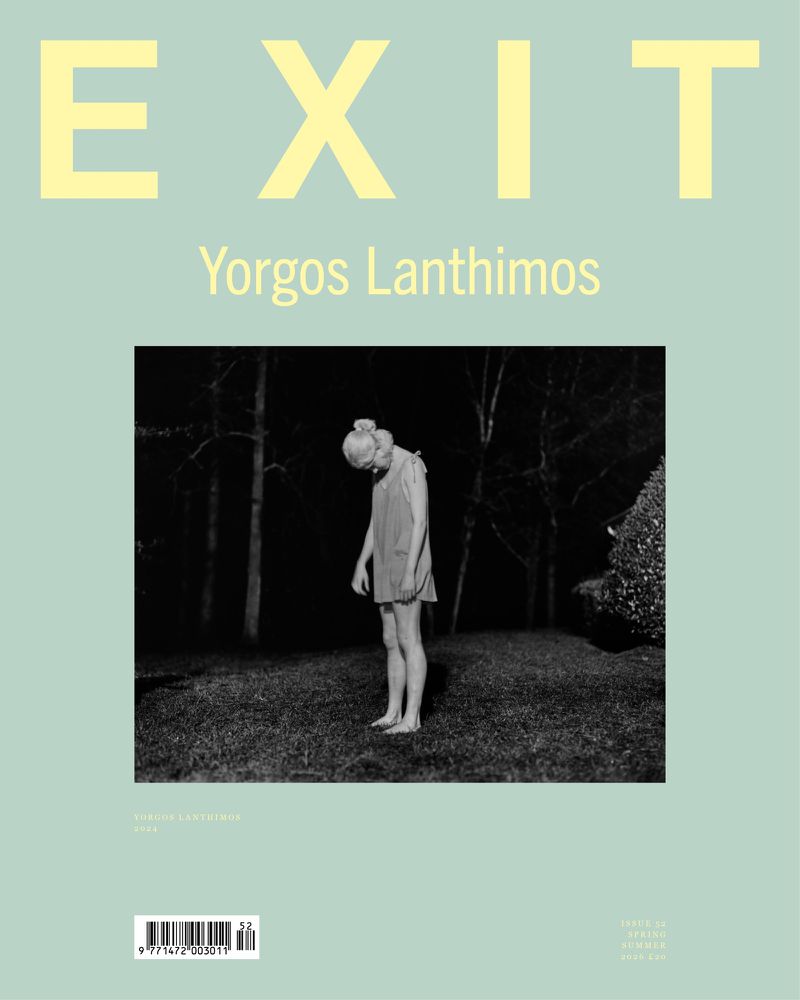 EXIT Magazine issue 52 cover featuring a black and white photograph by Yorgos Lanthimos of a woman standing in a garden at night.