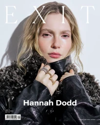 Hannah Dodd on the cover of Exit Magazine Issue 52 wearing a black leather jacket with shearling trim and metallic rings.