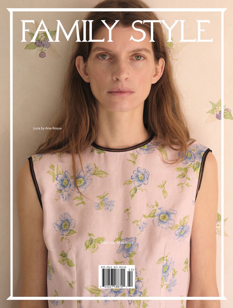 A young adult female model poses for a fashion magazine cover, wearing a floral dress against a neutral background with floral accents.