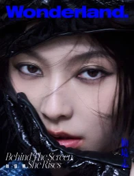 Close-up portrait of model Jiali Zhao with dark winged eyeliner wearing a glossy black hat for Wonderland China.