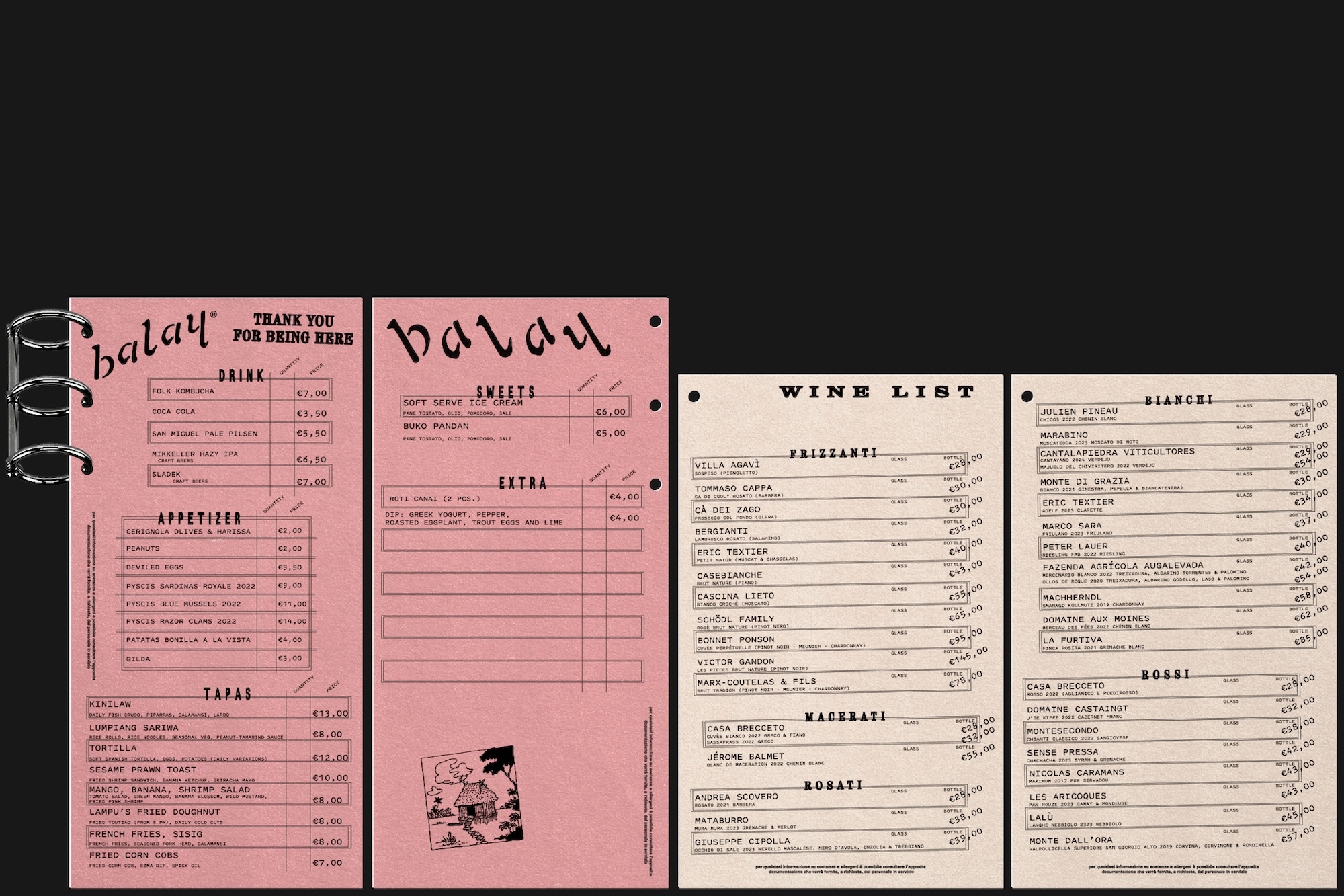 Balay restaurant printed paper menus and wine list laid out on a dark surface, featuring pink and cream paper stock.