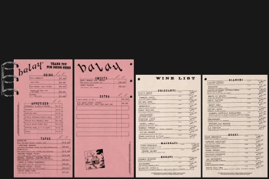 Balay restaurant printed paper menus and wine list laid out on a dark surface, featuring pink and cream paper stock.