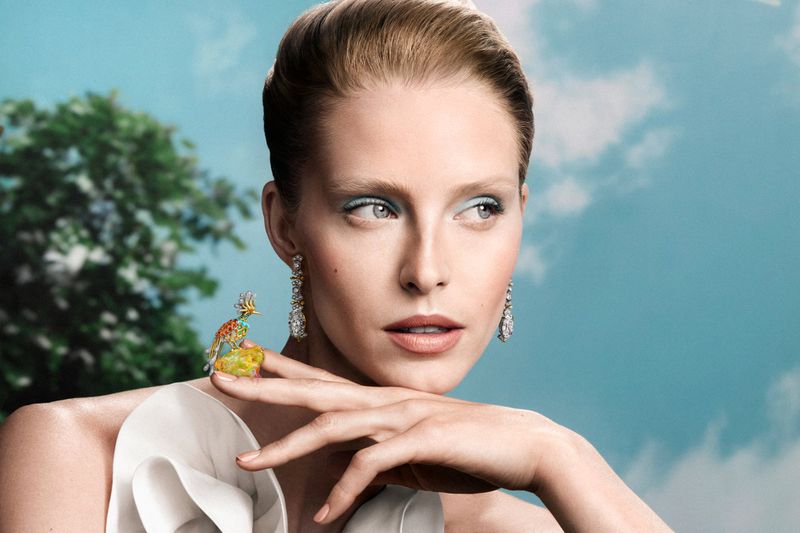 Model Abby Champion wearing high jewelry earrings and a bird brooch for Tiffany and Co Blue Book 2026 campaign.