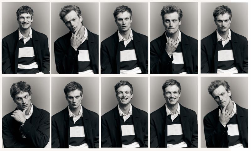 Black and white portrait grid of a man wearing a dark blazer over a striped rugby shirt in a studio setting.