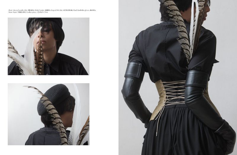 Editorial layout featuring a model wearing a black shirt, khaki corset, and feathers against a white background.