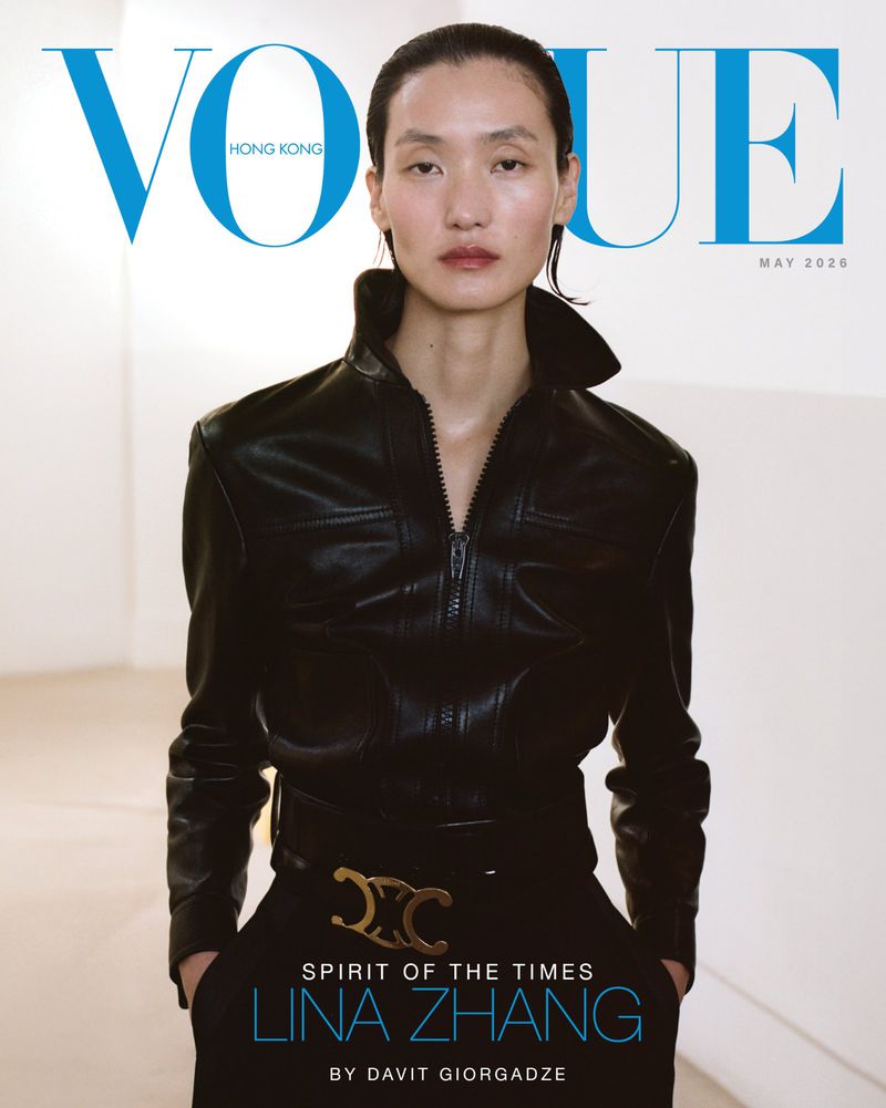 Vogue Hong Kong cover featuring Lina Zhang wearing a black leather jacket and pants with a gold belt buckle against a neutral backdrop.