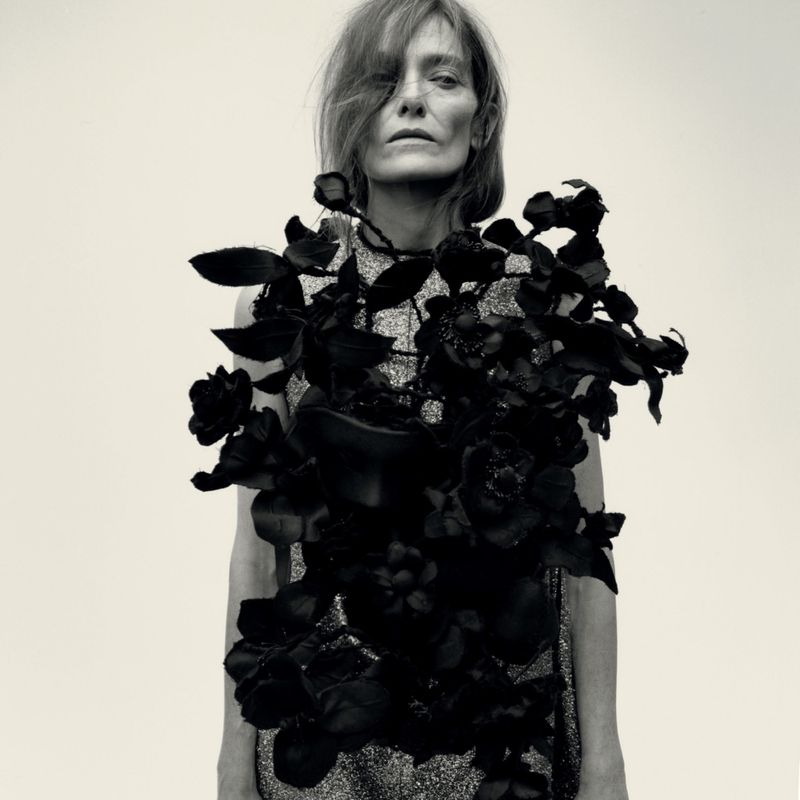 Model wearing a heavily textured dark floral garment against a neutral background for Re-Edition Magazine photographed by Kito Munoz