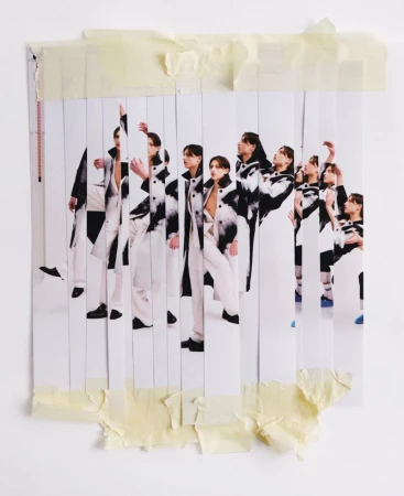 Collage of vertical paper strips showing a male model posing, taped at top and bottom with masking tape.