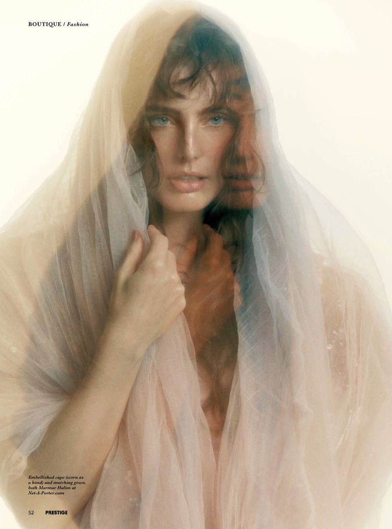 Model Marinet Matthee wearing sheer veiled tulle fabric in a multiple exposure fashion portrait for Prestige Magazine Asia by Joel Low.