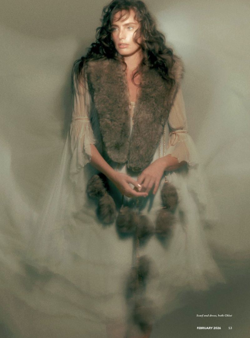 Model Marinet Matthee wearing a white dress and fur vest in a dreamy editorial portrait for Prestige Magazine Asia.