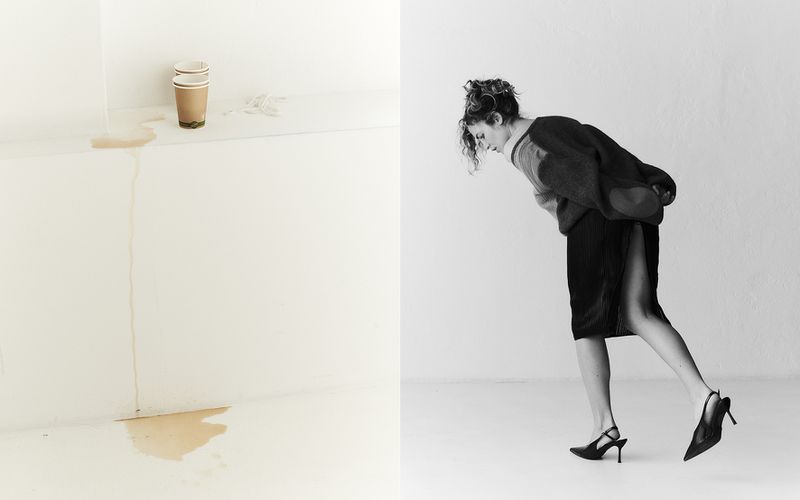 Monochrome diptych showing paper coffee cups with a liquid spill on the left and a woman leaning forward on the right against a plain background