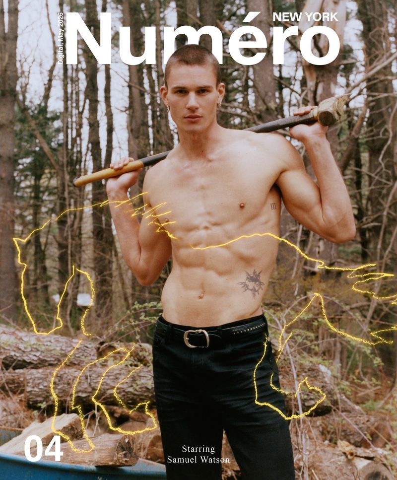 Magazine cover featuring a shirtless male model with black pants and a hammer against a backdrop of trees and digital horse illustration.