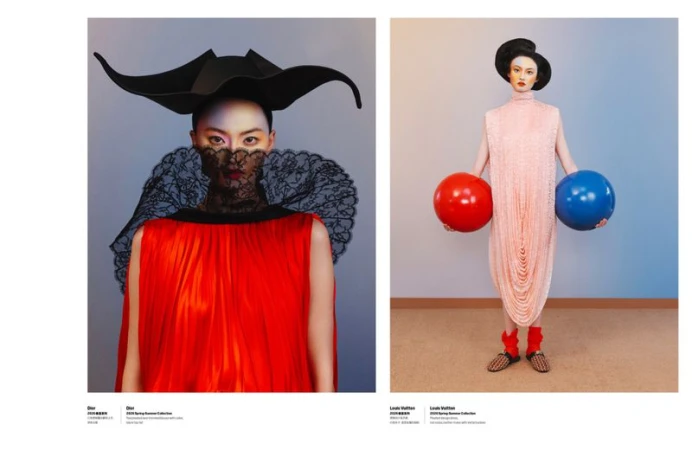 Model He Cong wearing a red dress with black lace collar and structured hat photographed by Zhong Lin for W Magazine China