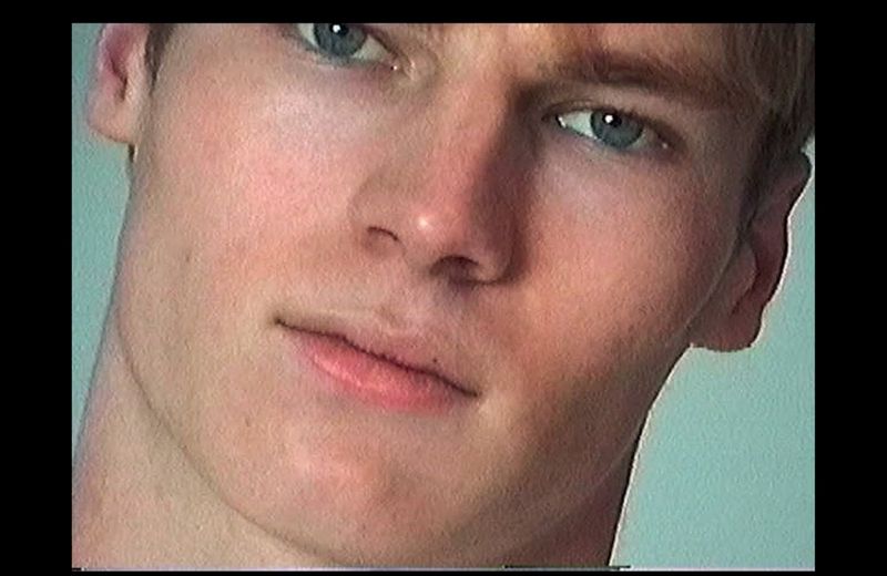 Close-up portrait of model Henry Rank with blue eyes captured for HERO USA by photographer Fabien Kruszelnicki.