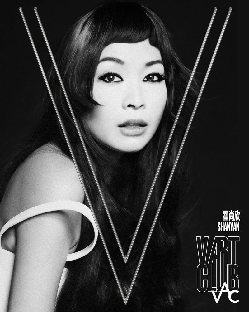 Black and white portrait of an Asian woman with geometric lines, text, and minimal shoulder exposure against a dark backdrop.