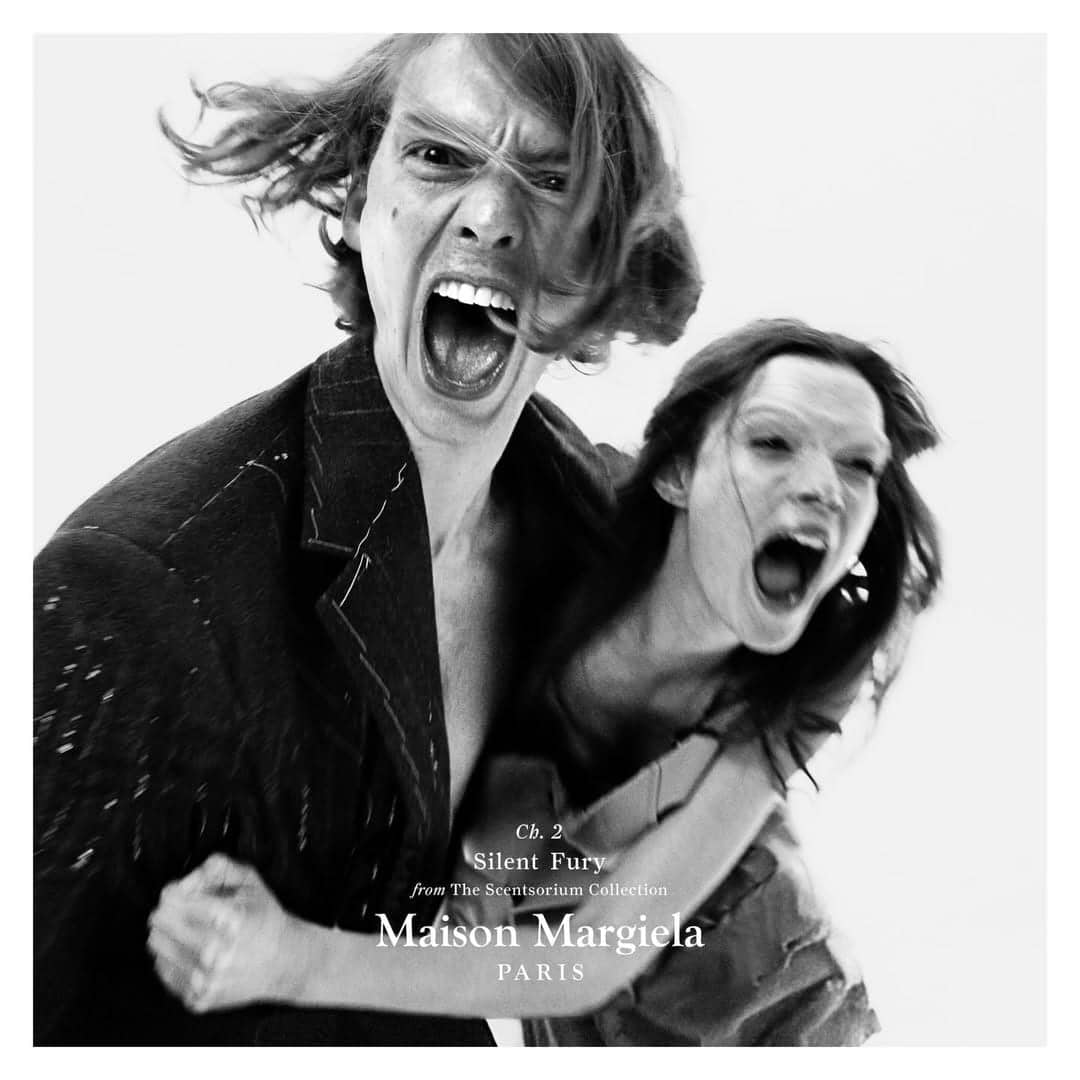 Monochrome ad campaign image featuring two models shouting against a white backdrop for Maison Margiela