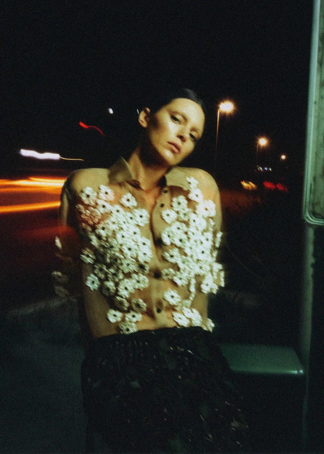 Kendall Jenner in sheer beige floral shirt at night for Khaite Spring 2026 ad campaign photographed by Drew Vickers