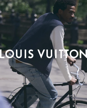 Tyshawn Jones riding a bicycle in Central Park for Louis Vuitton Pre-Fall 2026 Men's Campaign