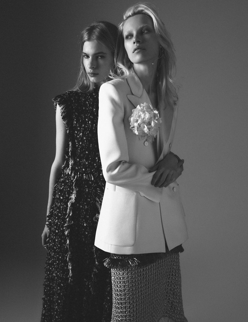 Two female models posing in monochrome editorial fashion for Flaunt magazine, photographed by Vicent Mahiques.