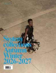 Model in black ribbon dress standing on concrete ground from high angle view with blue typography