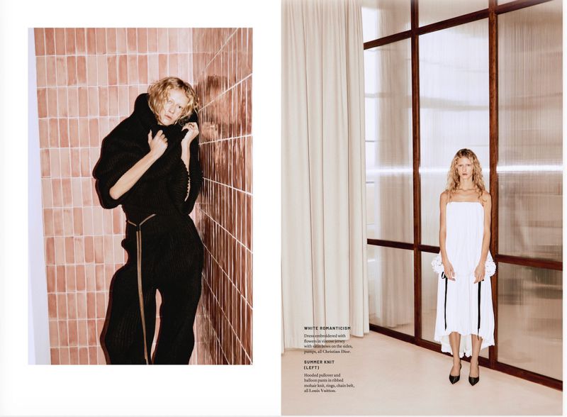 Model Kate van Berne in a black knitted outfit leaning against terracotta tiles, paired with a white dress inside.