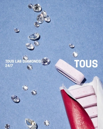 Overhead studio shot of TOUS lab-created diamonds with a pink lipstick tube and a stick of gum against a light-blue background.
