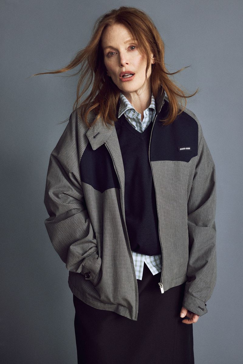 Julianne Moore wearing a houndstooth jacket and dark trousers against a grey backdrop for Family Style Open Concept