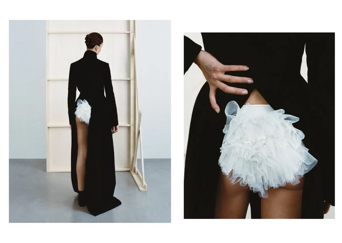 Diptych of model Zsela seen from behind wearing a tailored black coat with a back cutout revealing layered white tulle ruffles.