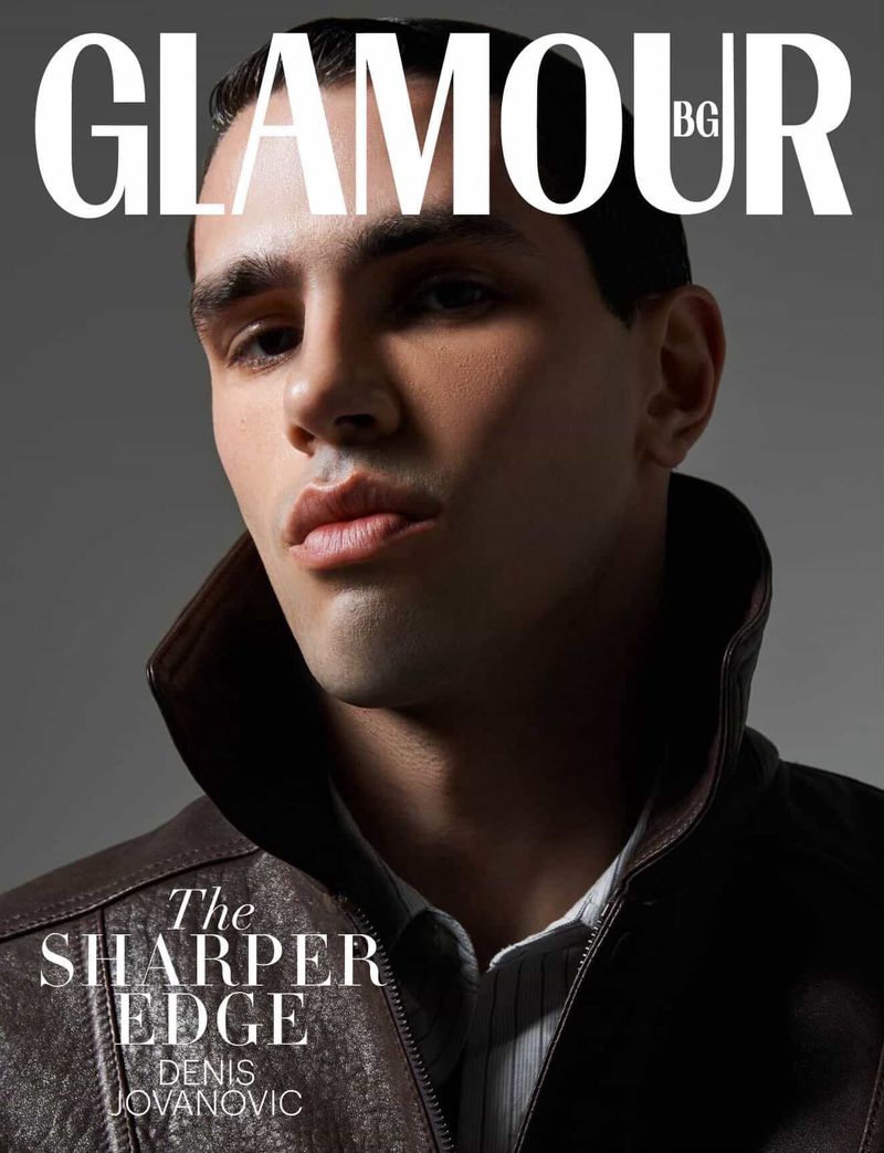 Close-up portrait of a male model wearing a dark leather jacket against a grey studio backdrop for Glamour Bulgaria