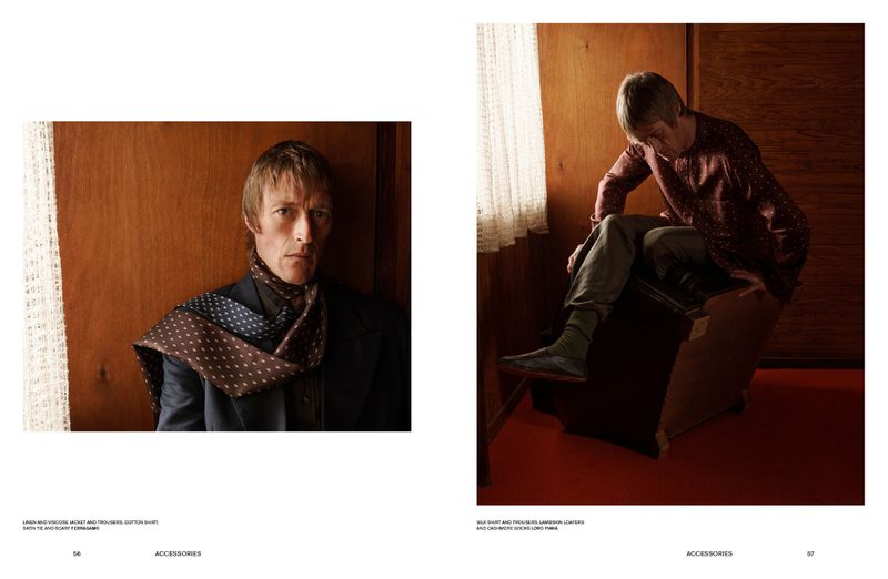 Editorial spread layout featuring a man wearing a patterned scarf and suit jacket next to a man sitting on a chair against wood panels