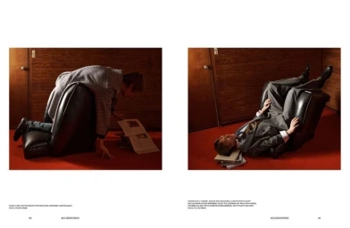 Two-panel fashion editorial spread showing a man in a grey suit interacting with a black armchair on a red carpet floor.