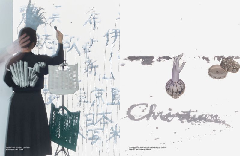 Split view fashion editorial with a person painting Japanese script on a wall and product still life items
