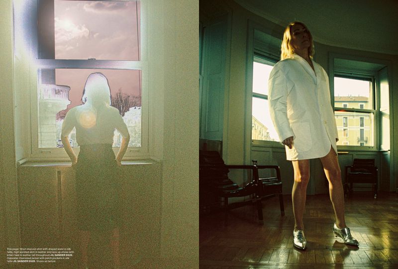 Kim Gordon wearing white Jil Sander jacket and metallic shoes in an interior room for AnOther Man Magazine editorial