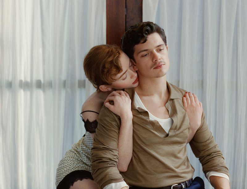 Sadie Sink resting her head on Noah Jupe's shoulder in a British Vogue editorial portrait