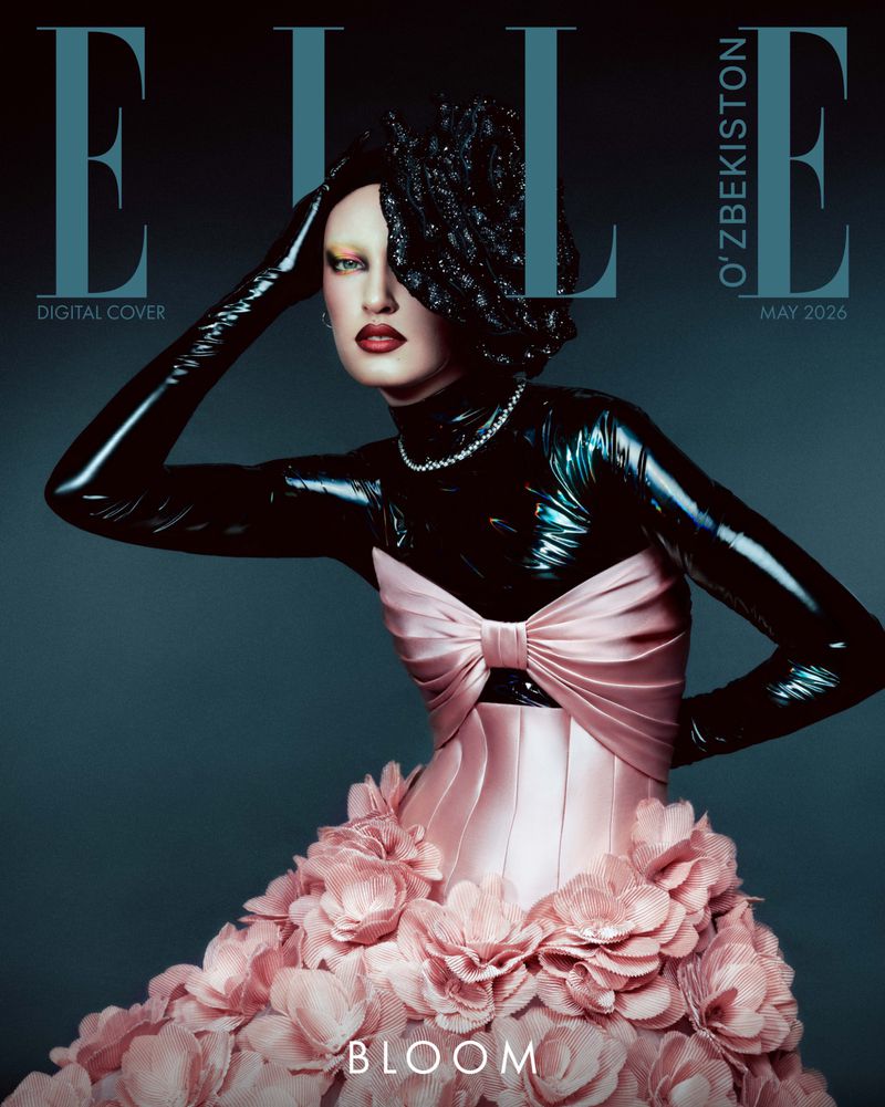 Model wearing black latex top with long gloves, diamond necklace, and pink ruffled gown against a dark background for Elle Uzbekistan.