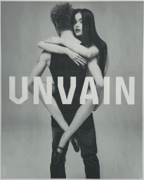 Monochrome fashion campaign image featuring a woman hugging a man from behind against a plain studio background with bold white typography.