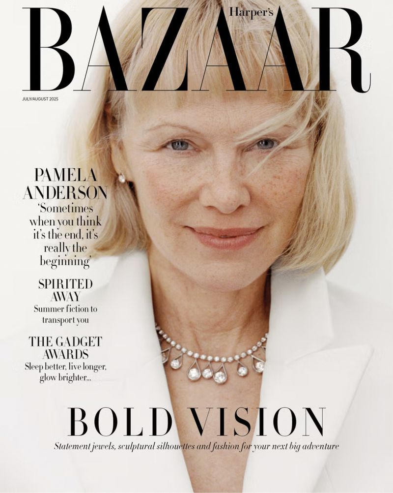 Pamela Anderson graces the cover of Harper's Bazaar in a close-up shot, wearing a white jacket and an elegant diamond necklace.
