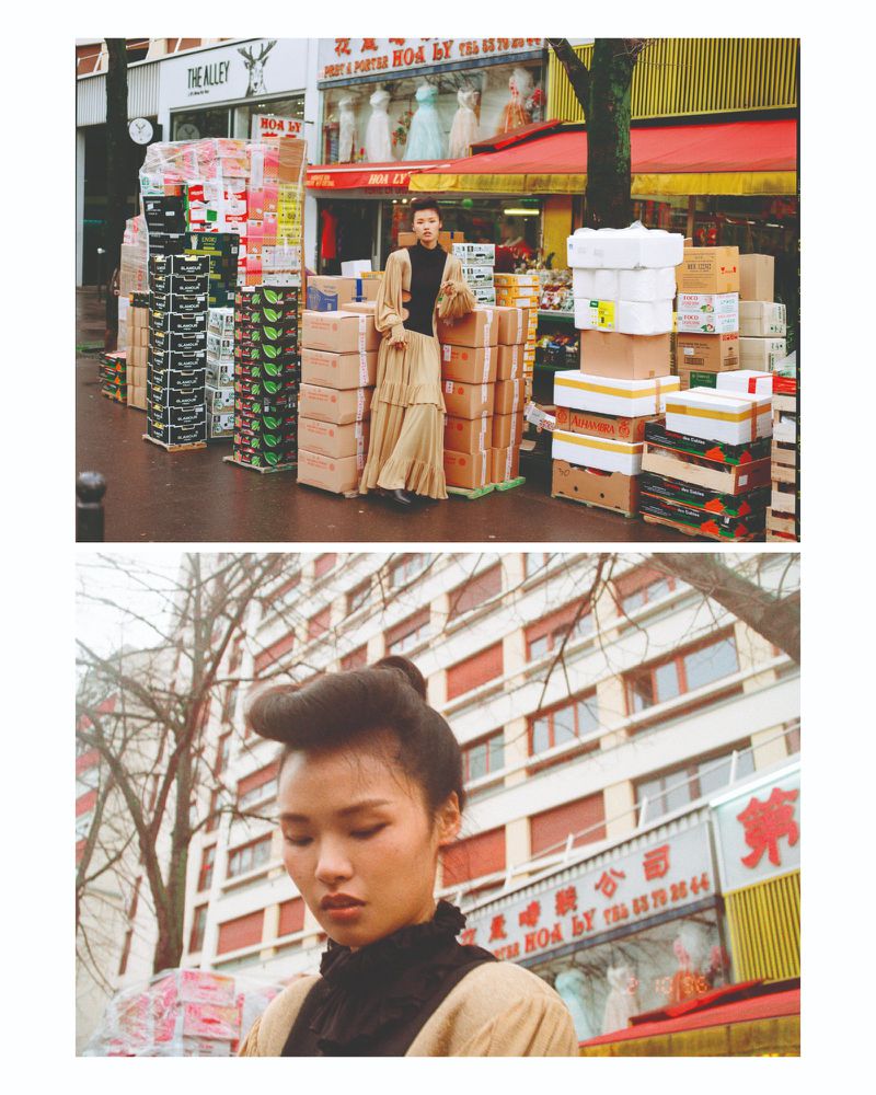 Model standing between stacked cardboard boxes on a city street and a portrait of a model against a building facade