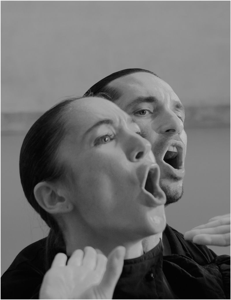 Monochrome portrait of a woman and man with mouths open in dramatic expression for Dapper Dan Magazine editorial.