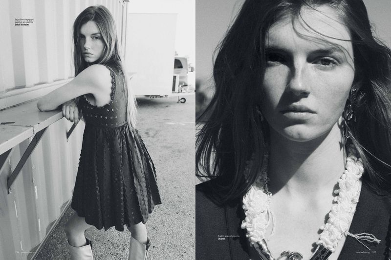 Model wearing a dark sleeveless dress and boots leaning outdoors next to a vehicle for Marie Claire Greece