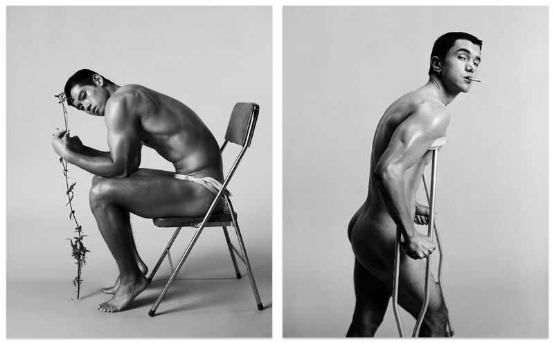 Two black and white fashion photographs of male models posing with props in a studio against a seamless grey backdrop.