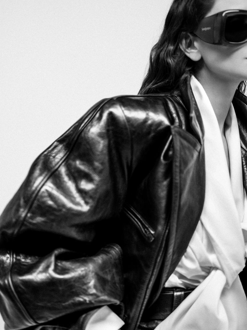 Close-up portrait of Eiza Gonzalez wearing a black leather jacket and sunglasses for Numero Netherlands.