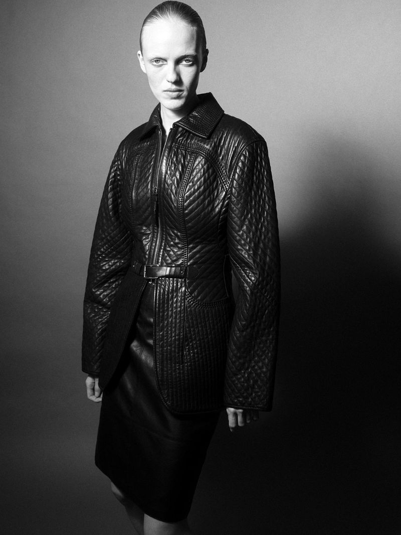 Model in quilted black leather jacket against grey seamless background for Cero Magazine BOY project.