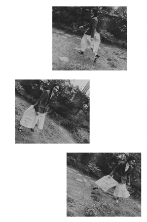 A black and white image displaying three stacked panels of a model walking across an outdoor path, styled in a jacket and layered trousers.