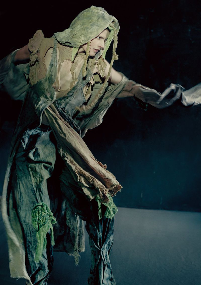 Model Saskia de Brauw wearing distressed green hooded apparel in an editorial by photographer Paolo Roversi for Luncheon Magazine