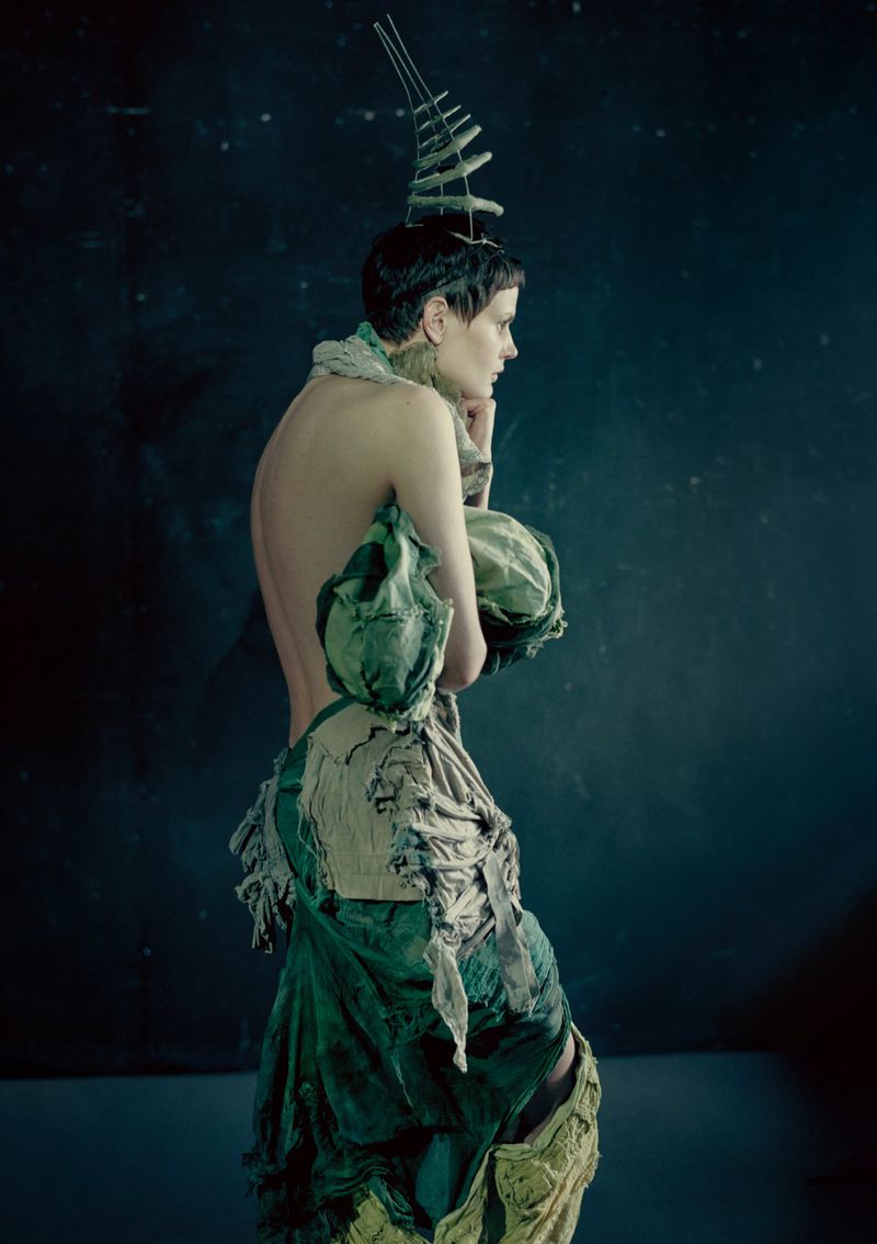 Model Saskia de Brauw wearing avant-garde green and beige sculptural fashion by Paolo Roversi for Luncheon Magazine