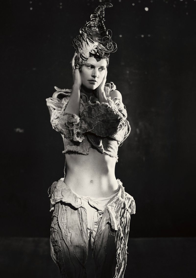 Model Saskia de Brauw with sculpted headdress and textured top for Luncheon Magazine photographed by Paolo Roversi.