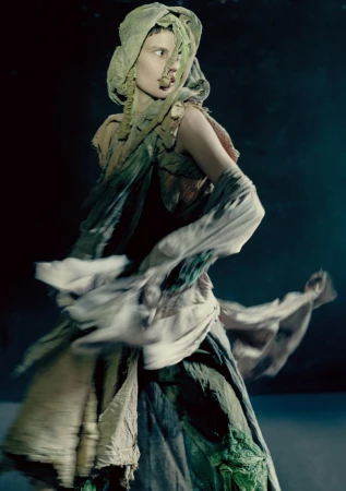 Model Saskia de Brauw in draped green and cream garments with a matching head wrap for Luncheon Magazine editorial.