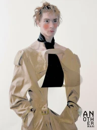 Illustrated portrait of a male model wearing a tan belted trench coat and black necktie against a plain white background.
