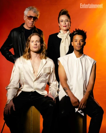 Portrait of four actors in dark and white attire against a warm orange gradient background for Entertainment Weekly.